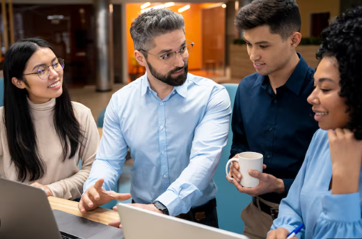 A diverse team of Indian professionals collaborating in a modern office.