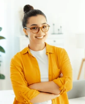 Portrait of a female Indian account manager in a professional setting.